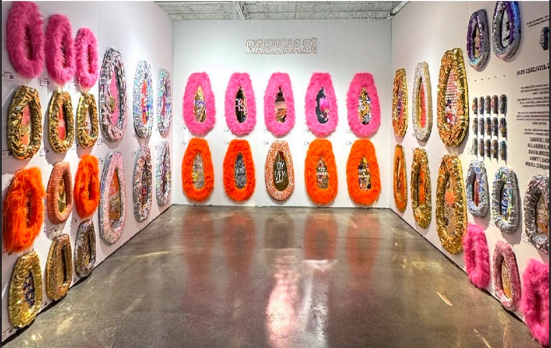 Papayas gallery exhibition with colorful papaya sculptures